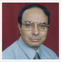 Dr. V. Kher